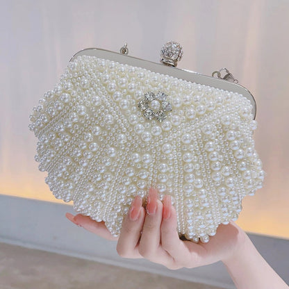 Royal Pearl Couture Clutch – Hand-Beaded Luxury