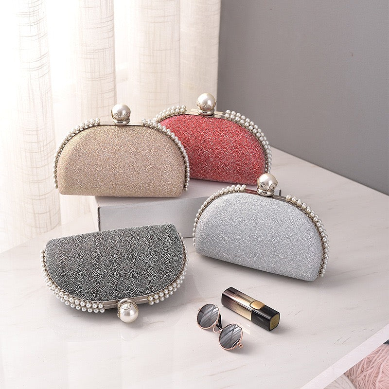 Pearl Arc Glitter Clutch – With Pearl Ball Closure